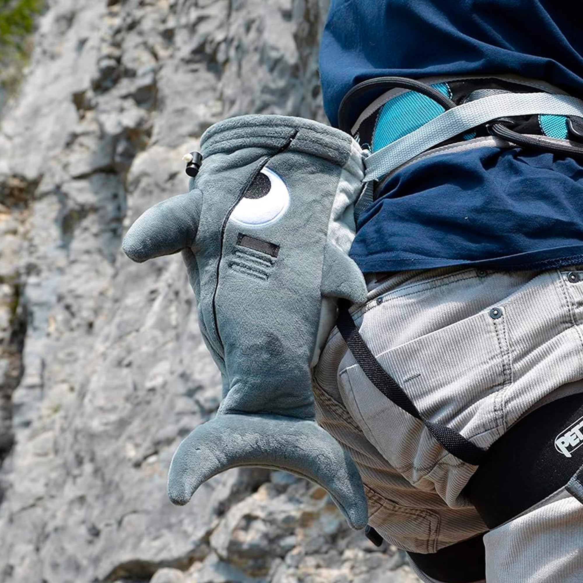 BG Climbing chalk bag clipped to climber on boulder for hands-free access benefit