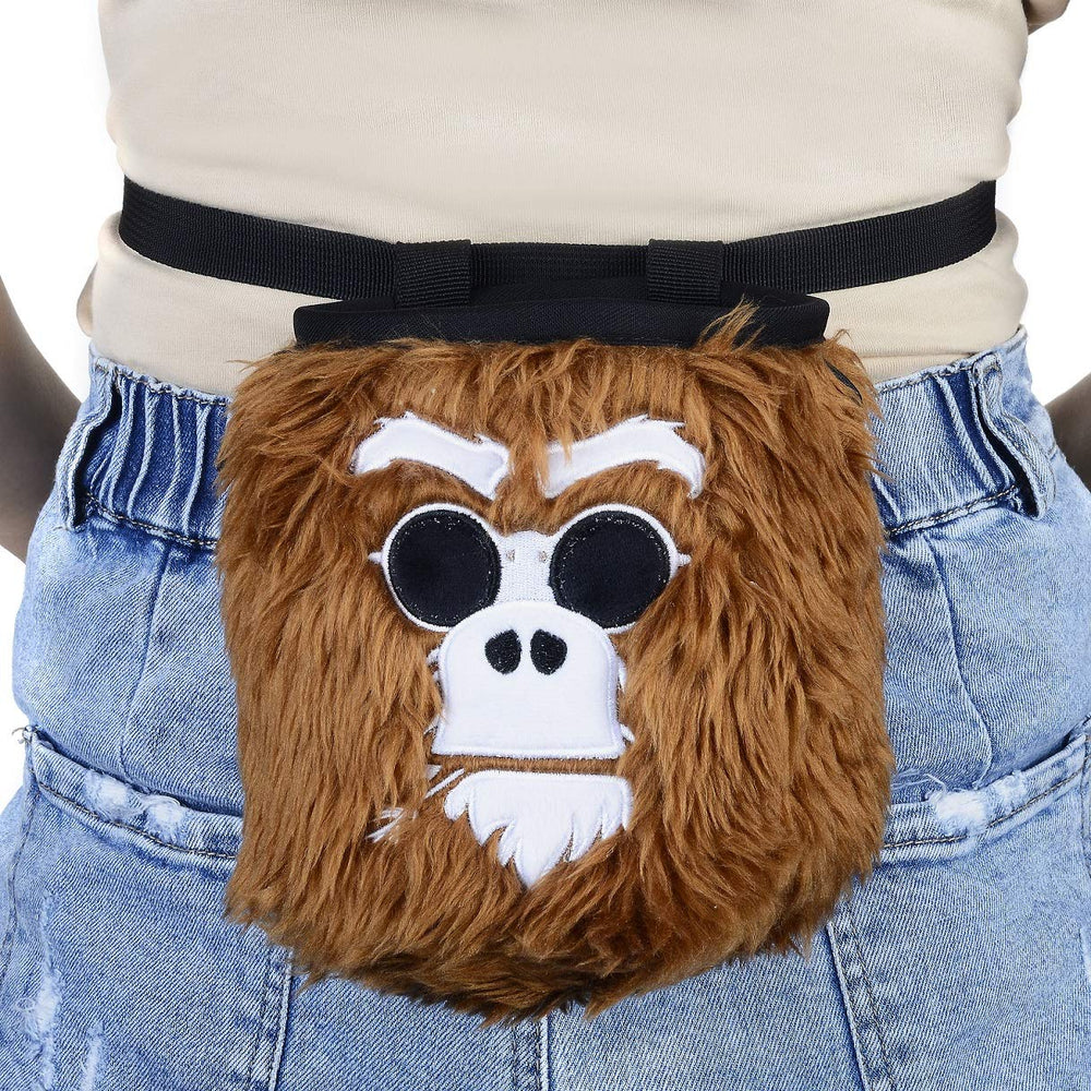 BG Climbing monkey chalk bag next to harness showing compact size advantage