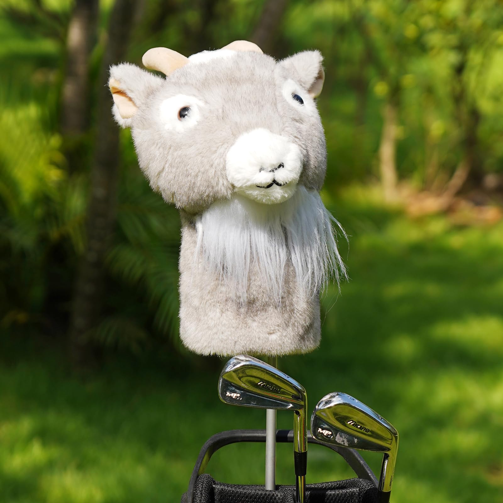 Big Crazy goat headcover next to driver for size comparison and fit reassurance