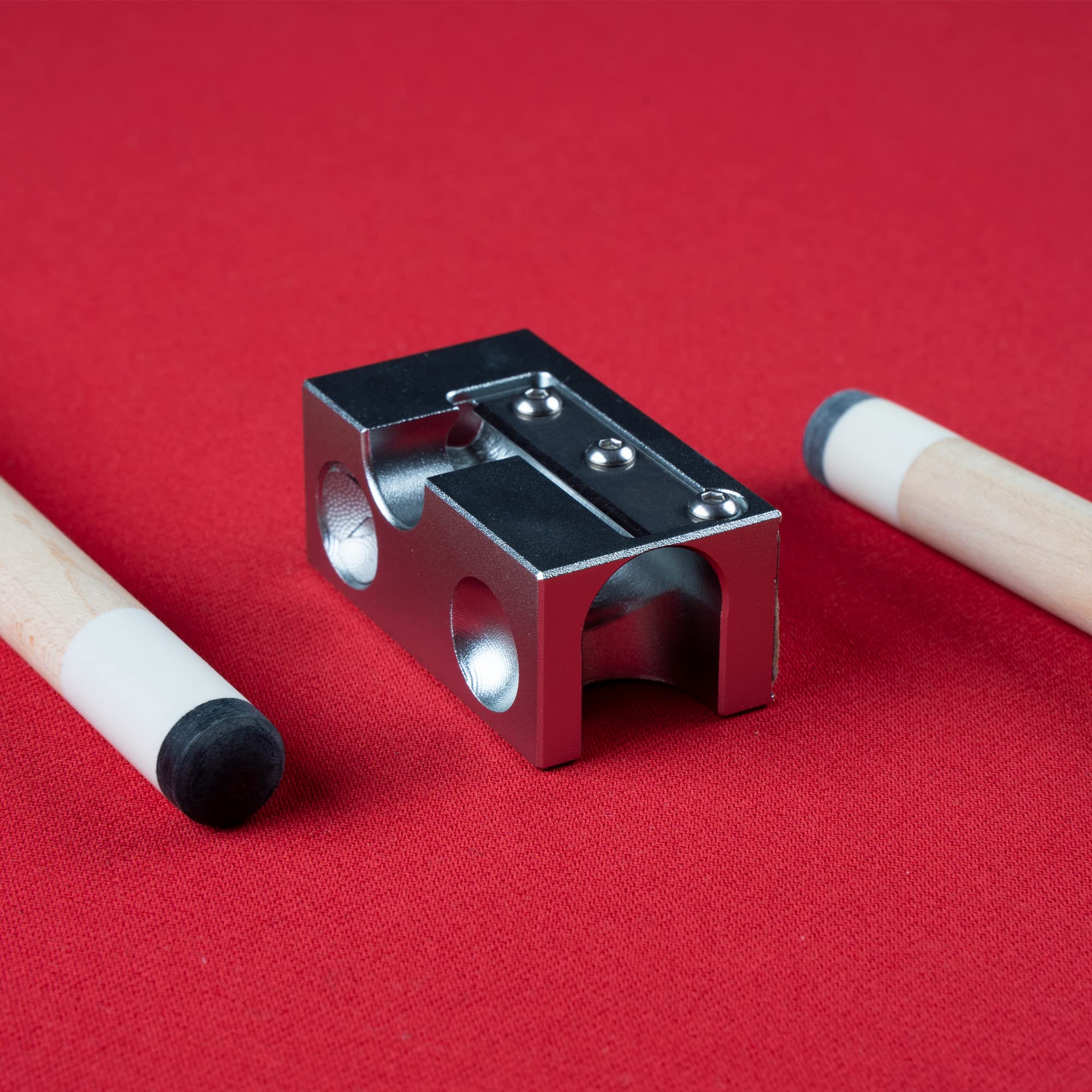 Billmart tool next to cue shaft showing compact size and portability for on-the-go repairs