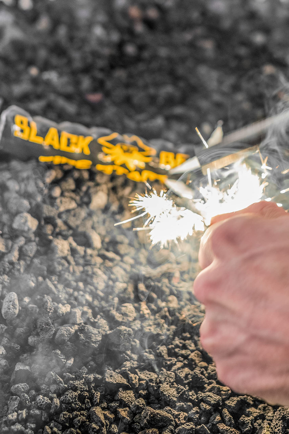 Black Beard ferro rod being struck to light tinder, demonstrating fast ignition benefit
