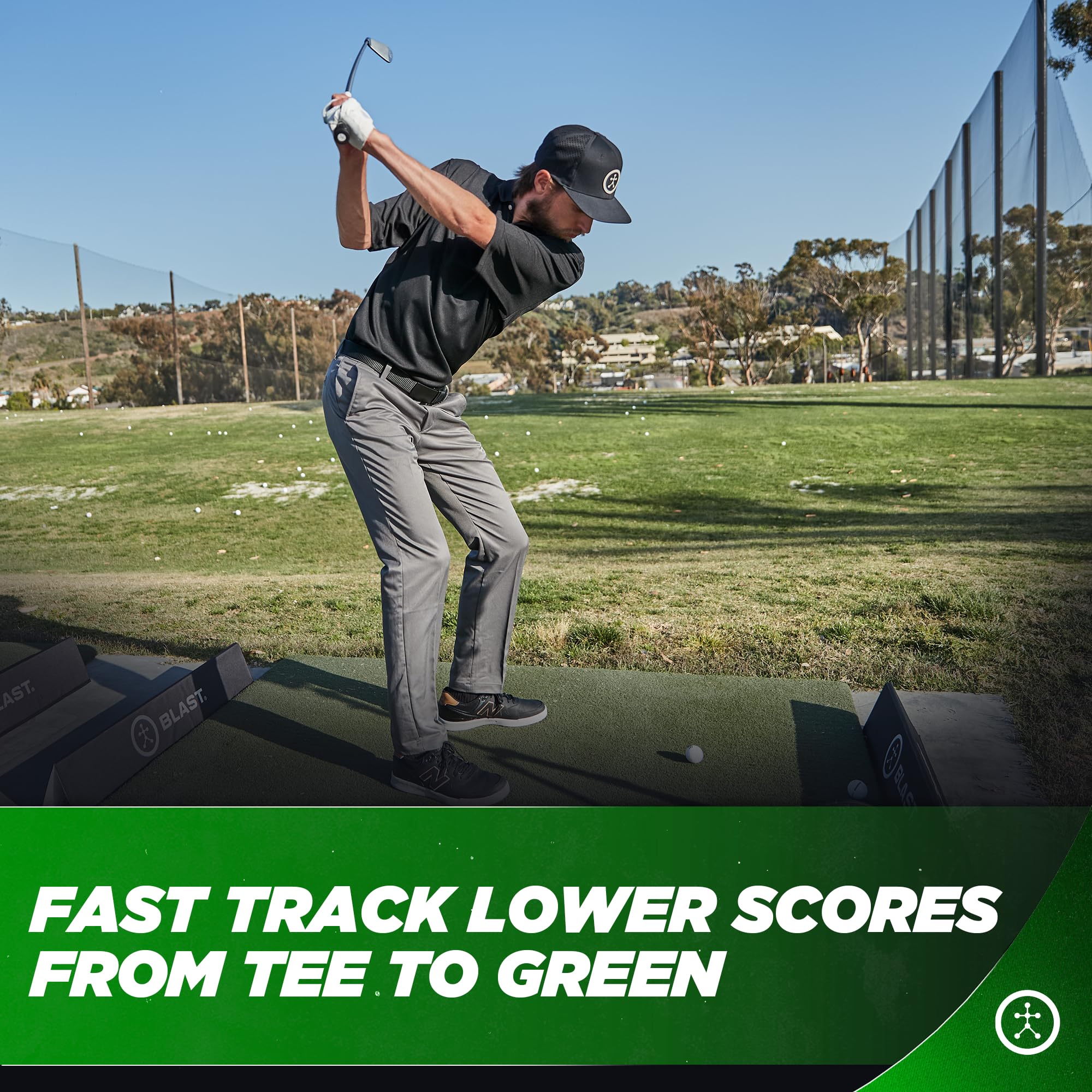 Golfer on driving range using Blast Motion to capture swings and compare performance