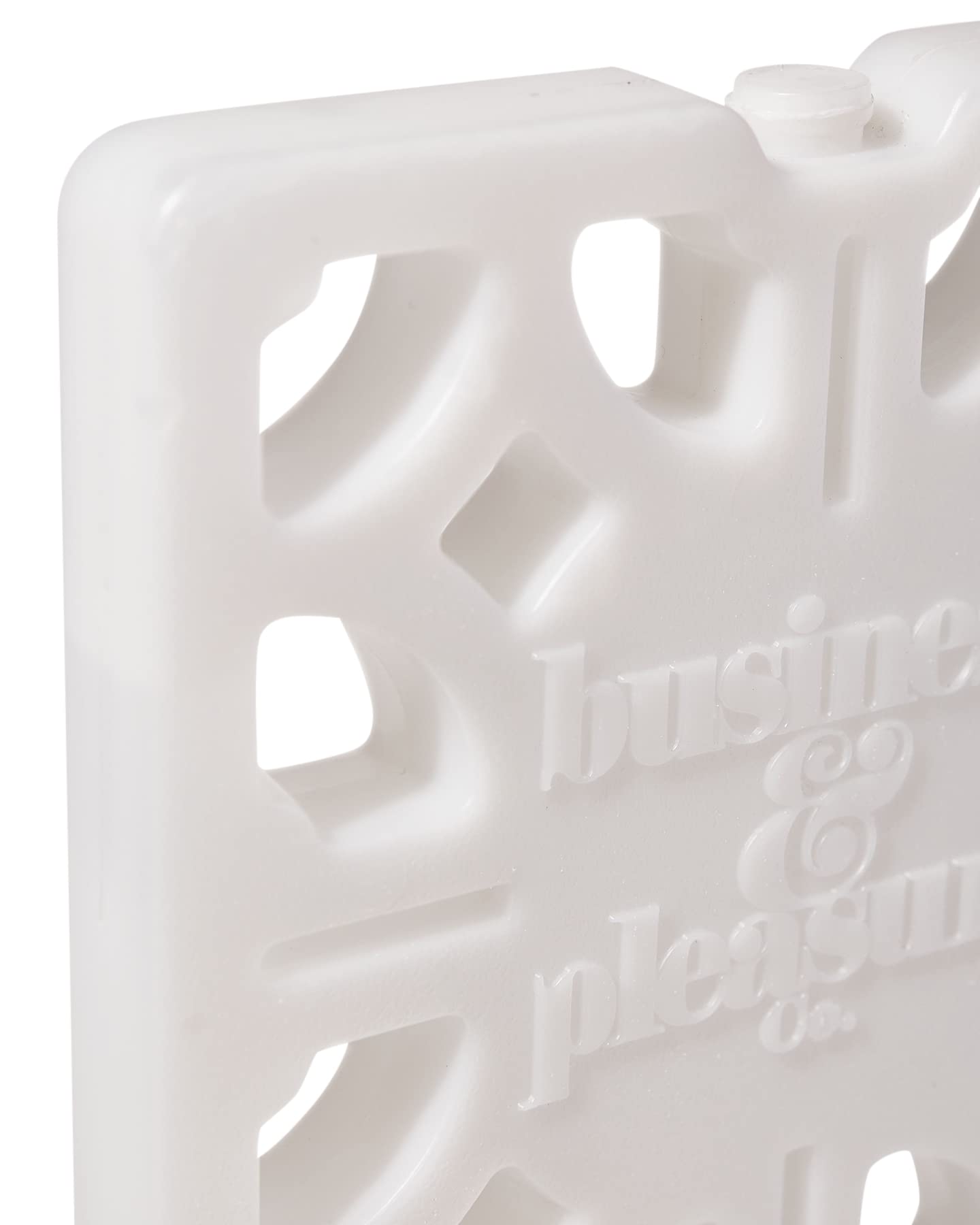 Business & Pleasure Co. Breeze Block next to a water bottle demonstrating scale
