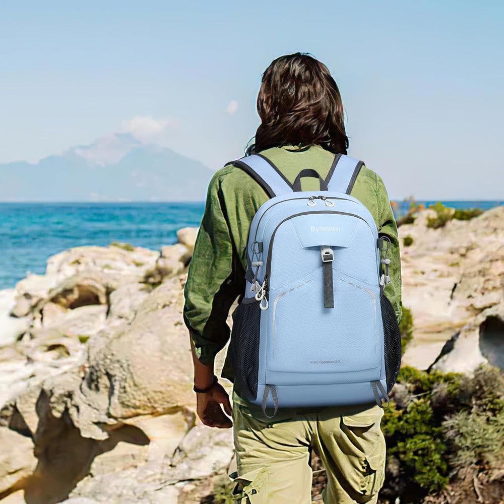 Bymontin daypack worn by hiker on trail illustrating outdoor convenience benefit