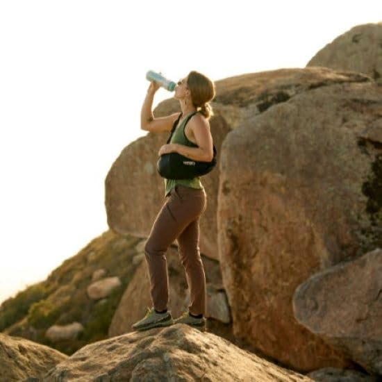 CamelBak Arete Sling 8 worn on a trail illustrating hands-free freedom