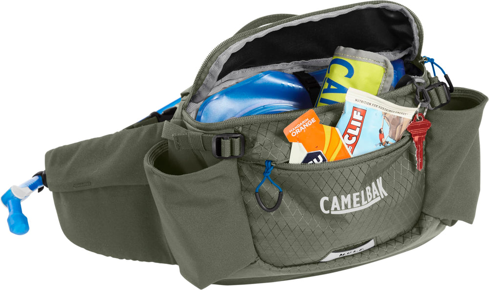 CamelBak M.U.L.E. 5 worn by rider on trail showing stable riding and quick access