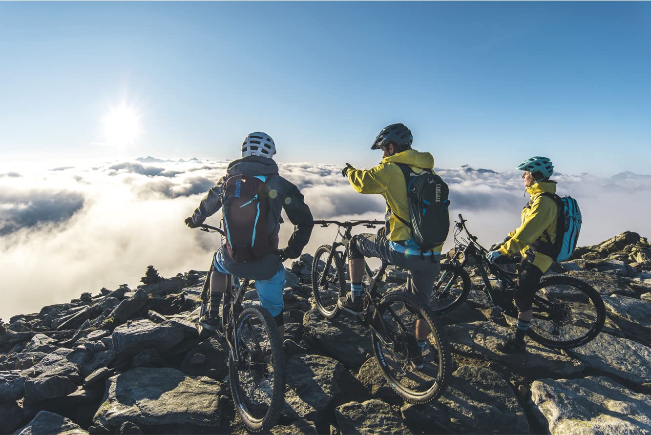 CamelBak exterior helmet carry shown, freeing hands and stowing helmet