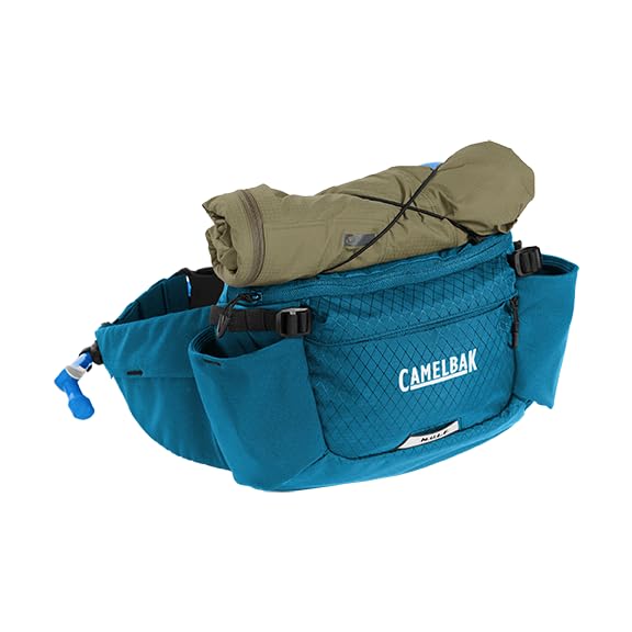 CamelBak M.U.L.E. 5 worn on a mountain bike ride showing low-profile fit and stability