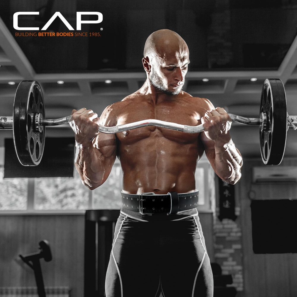 CAP Barbell belt laid beside a ruler showing 47in length and sizing clarity