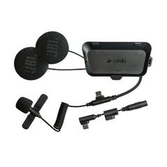 Cardo Packtalk Outdoor kit installed on helmet in ride setting showing seamless communication benefit