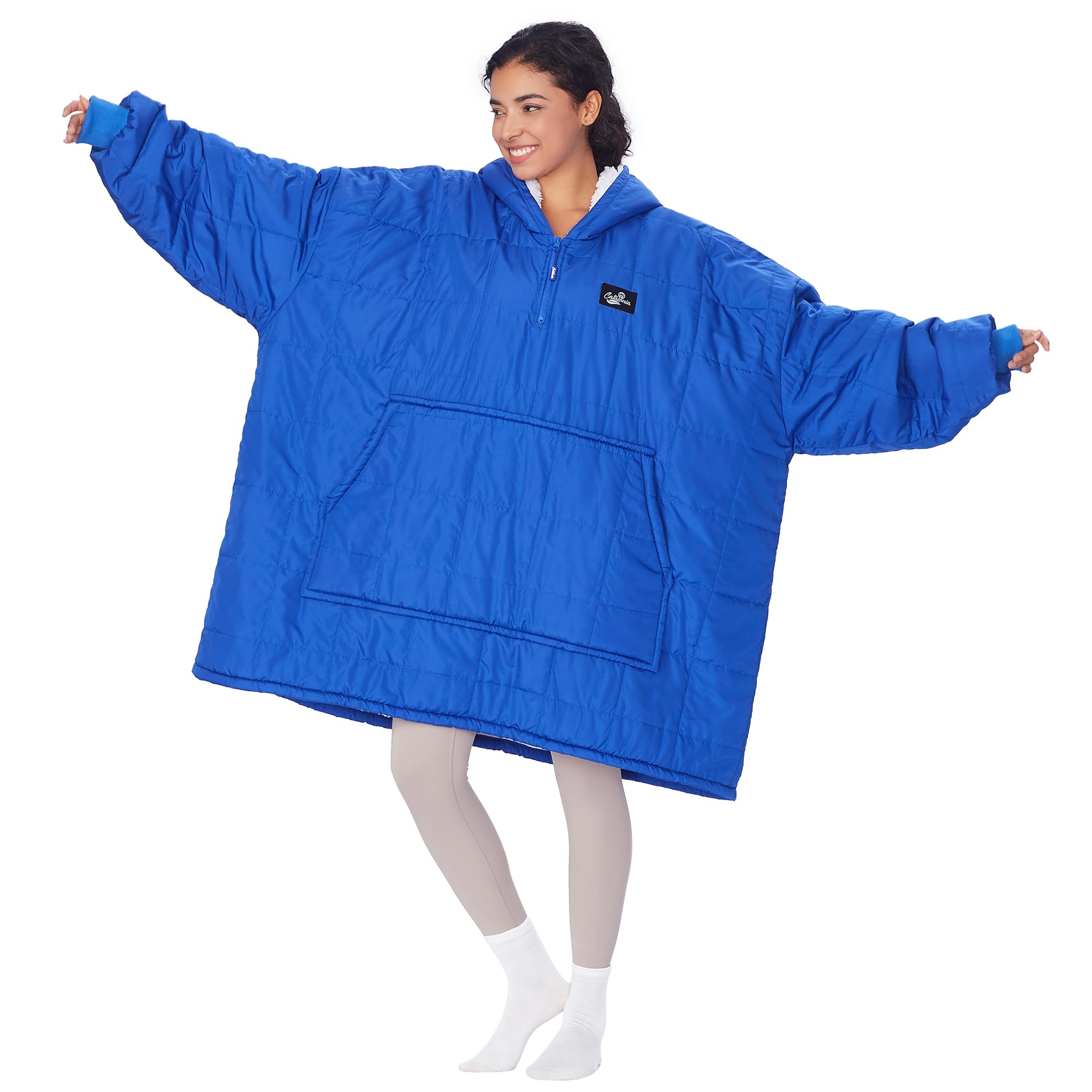 Catalonia front view of hooded poncho showing warm coverage and wind protection