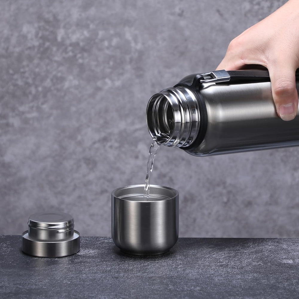 CDJ held in hand showing 34oz size and portability benefit