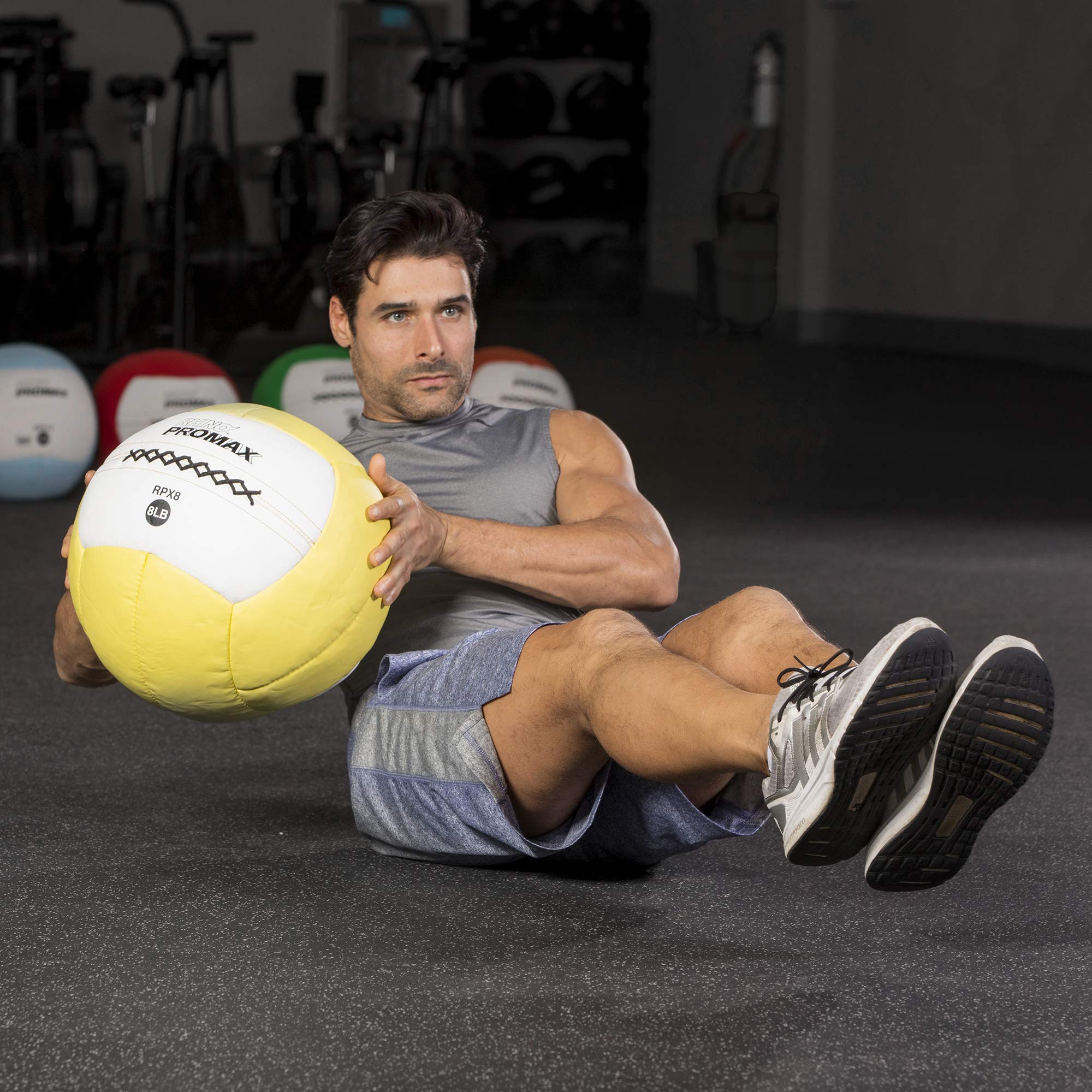 Champion Sports ball next to ruler showing consistent 14-inch diameter for technique