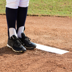 Champion Sports plate installed in-ground showing stable setup benefit