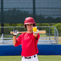 Champion Sports ball feeding through pitching machine for smooth reliable pitches