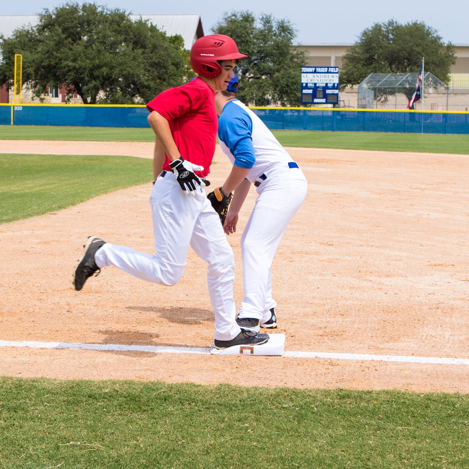 Champion Sports base beside a baseball glove showing size and portability