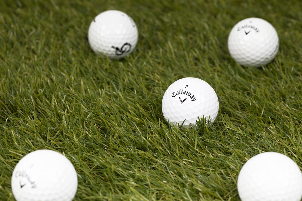 Clean Green Golf Balls close shot of logos and cosmetic marks showing quality inspection