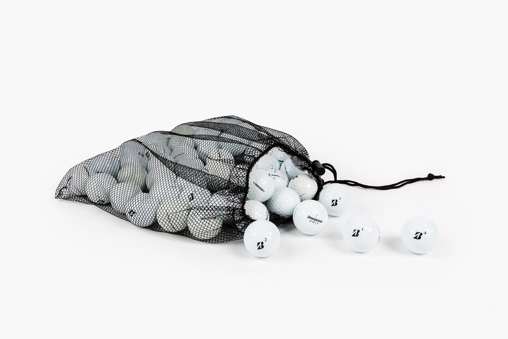 Clean Green Golf Balls packed in reusable mesh bag for easy transport and storage