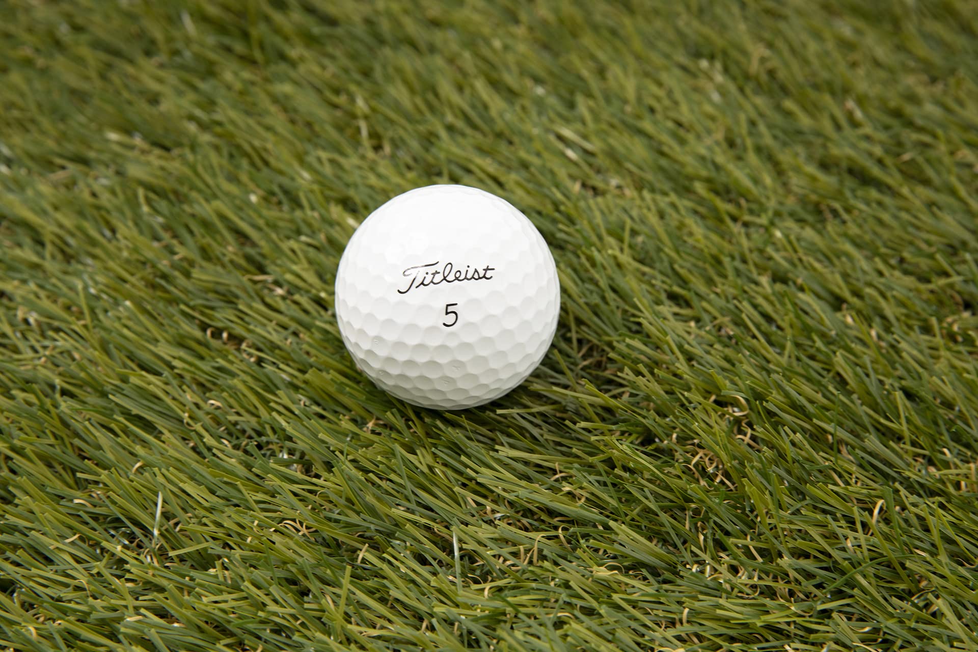 Clean Green Golf Balls open bag of bulk Pro V1s displaying quantity and value