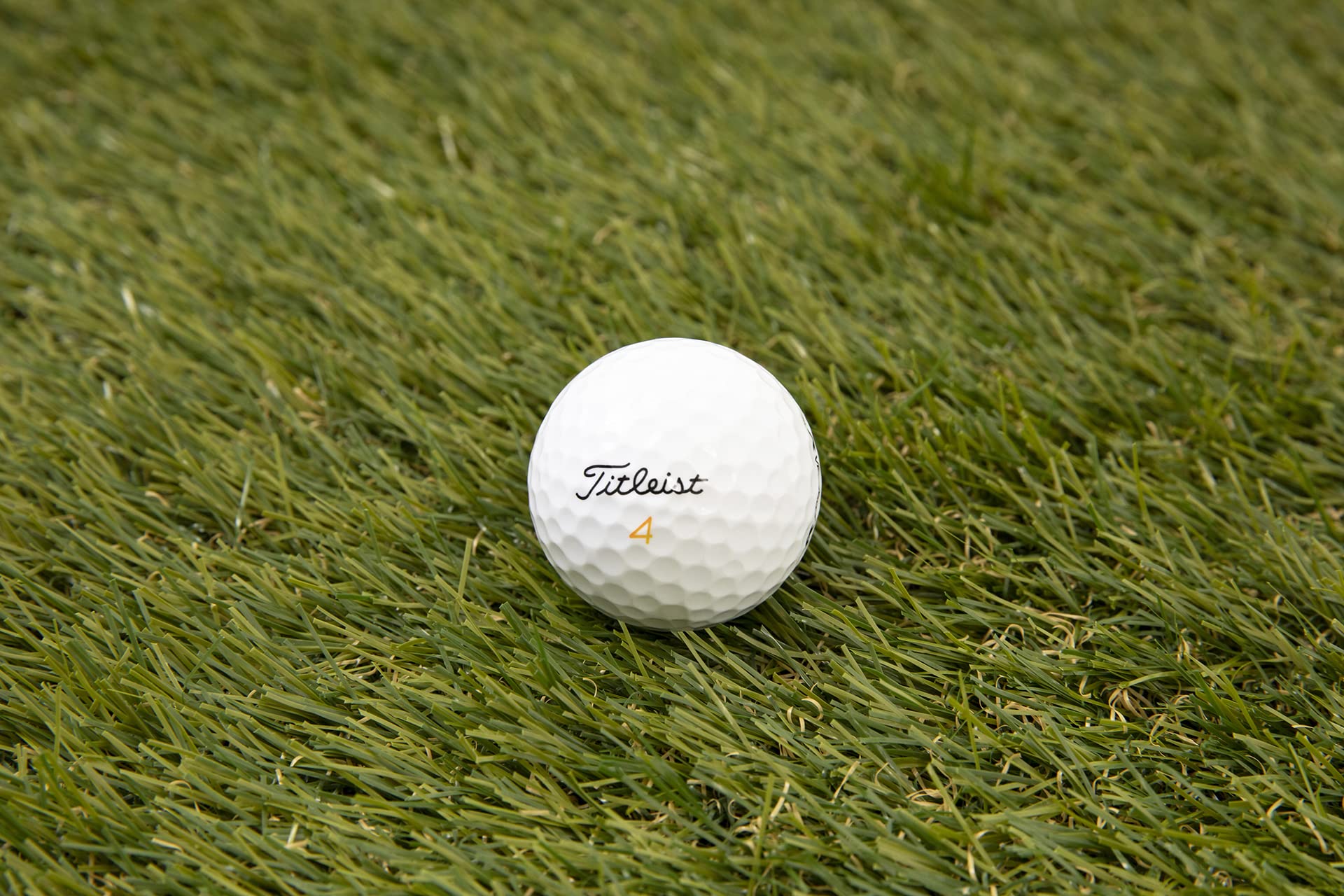 Clean Green Titleist Velocity on tee demonstrating ready-to-use performance on course