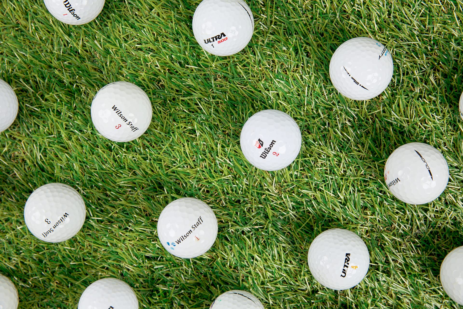 Clean Green Golf Balls pile on grass showing eco-friendly reuse advantage