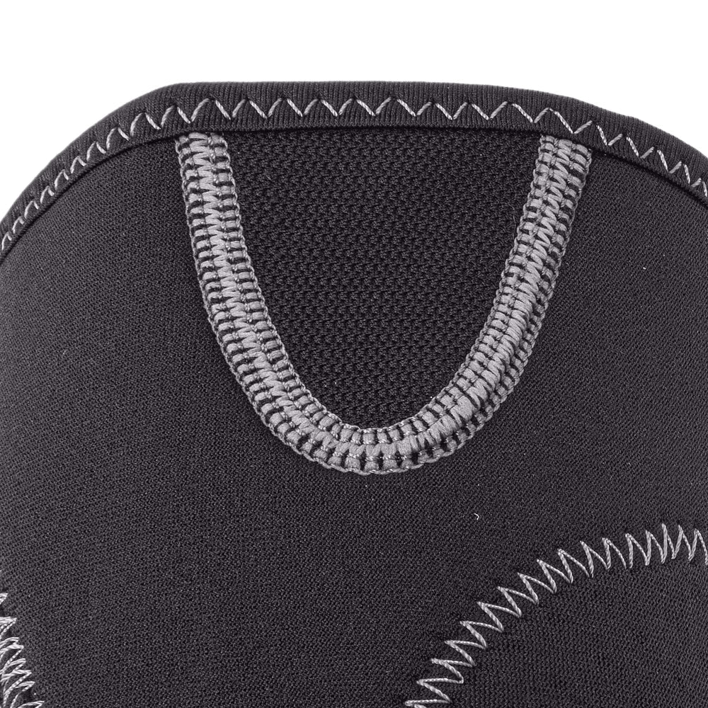 Cliff Keen knee pad on wrestler demonstrating mobility and mat protection