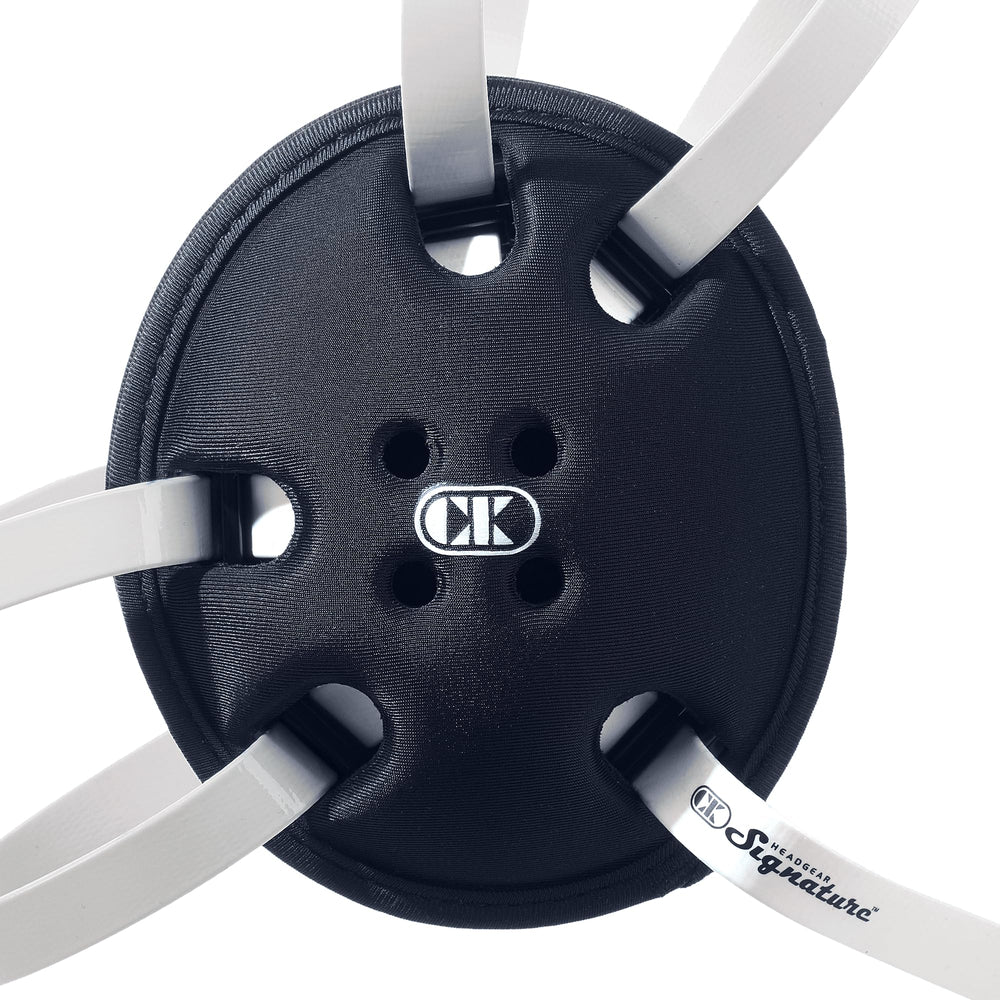Cliff Keen shell closeup highlighting polycarbonate composite strength and lightweight benefit