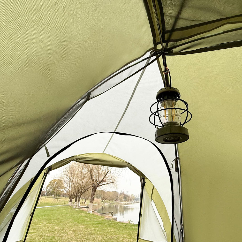 Clostnature tent at a campsite at dusk creating a sheltered outdoor living space
