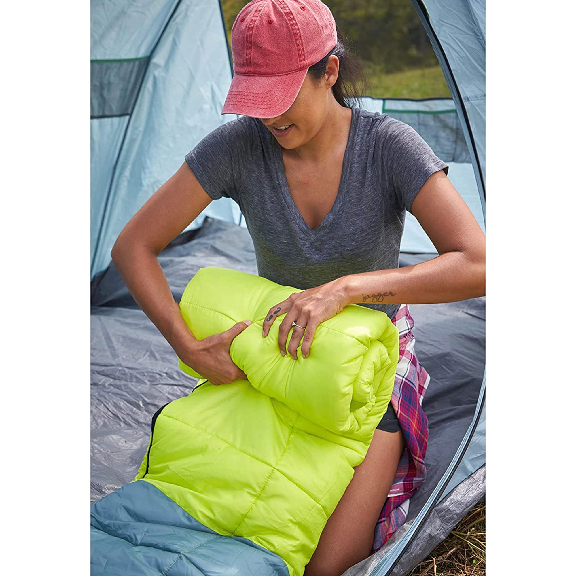Coleman sleeping bag packed in compression sack highlighting easy transport and small size