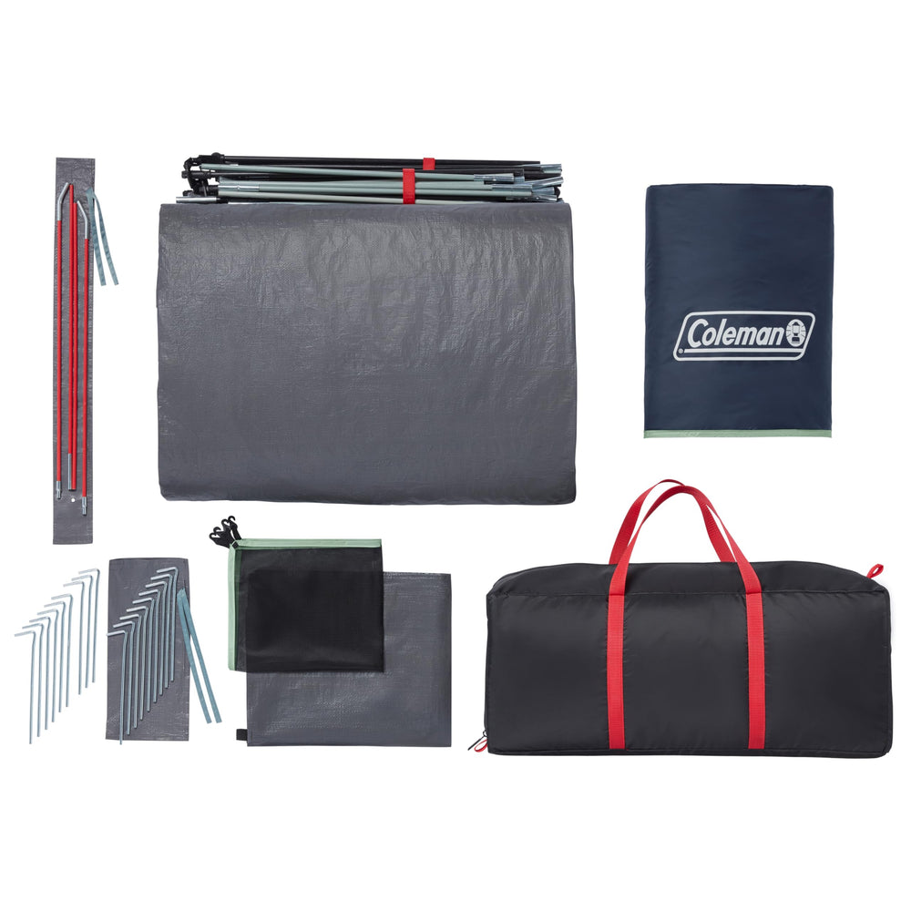 Coleman Skydome XL at campsite with family enjoying spacious, organized shelter