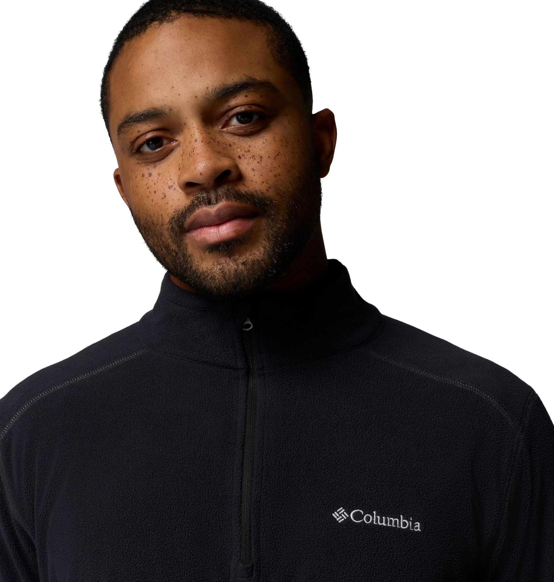 Columbia zipper and logo detail showing durable hardware and brand reliability benefit