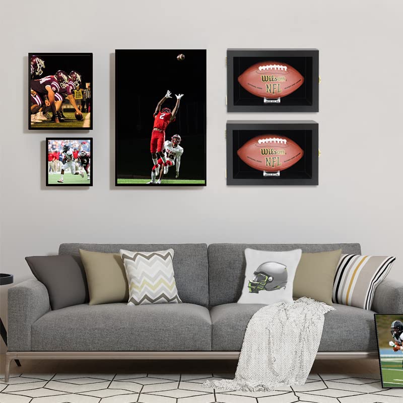 COMSREV interior clear stand holding a full-size football at a display angle