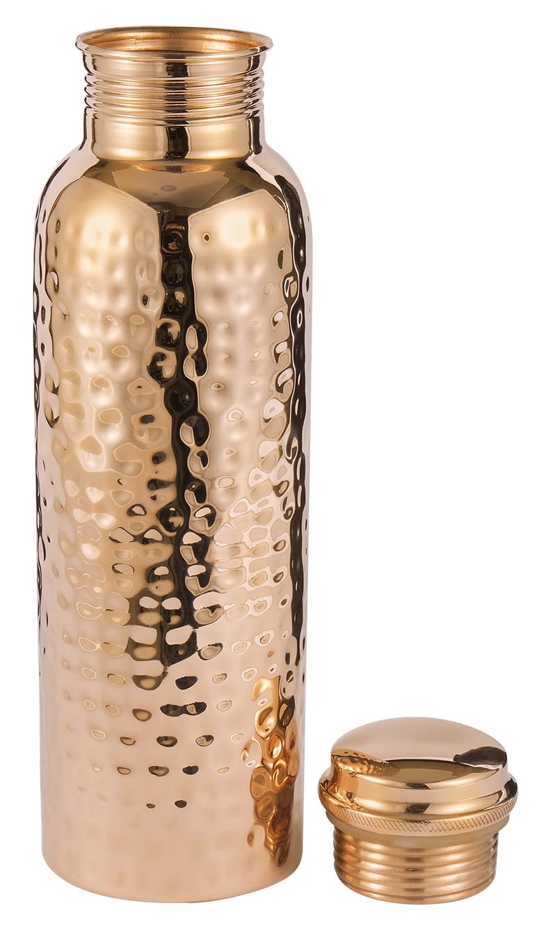 Copper Cure styled on dining table as decorative centerpiece and functional water vessel