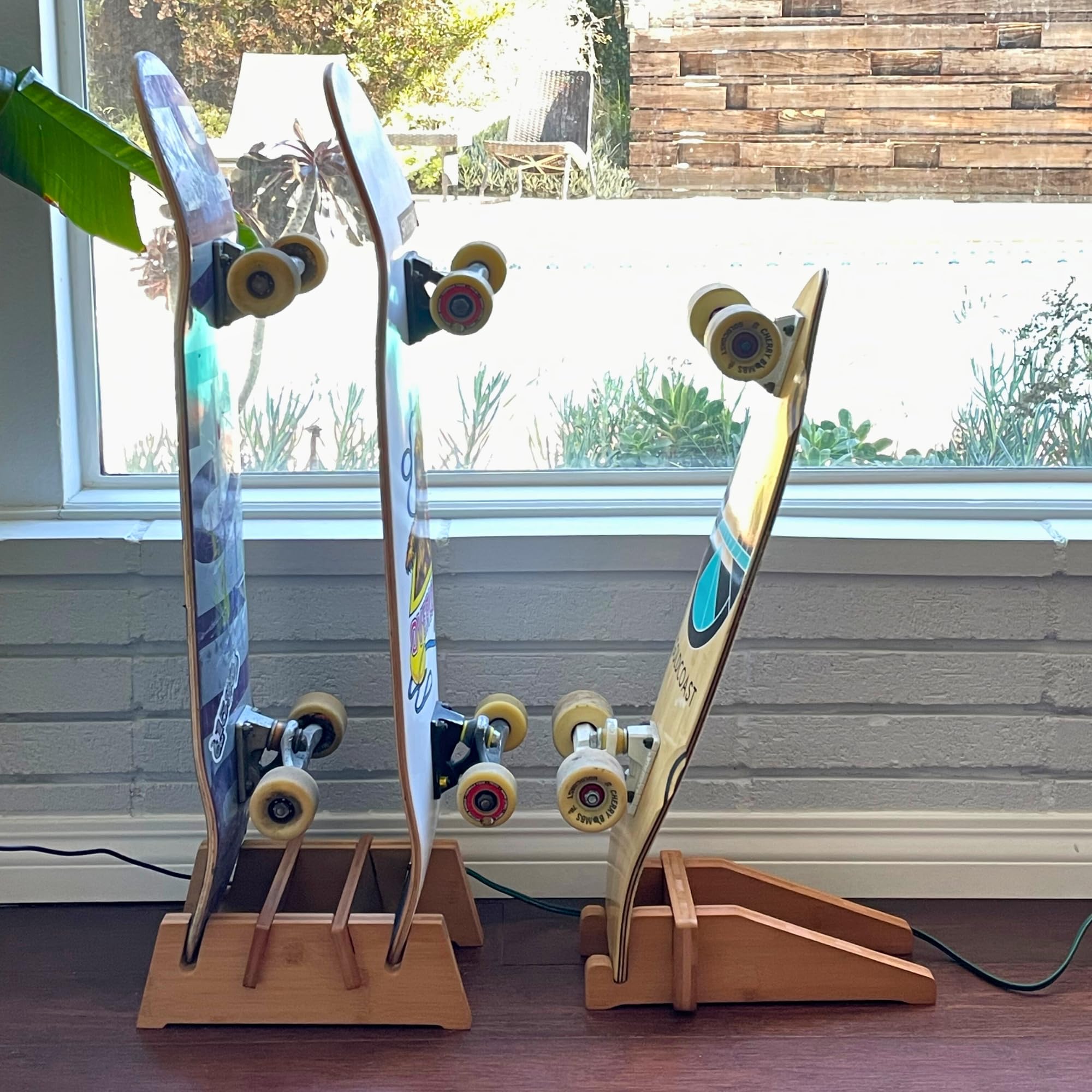 COR Surf stand holding two skateboards showcasing organized, visible storage