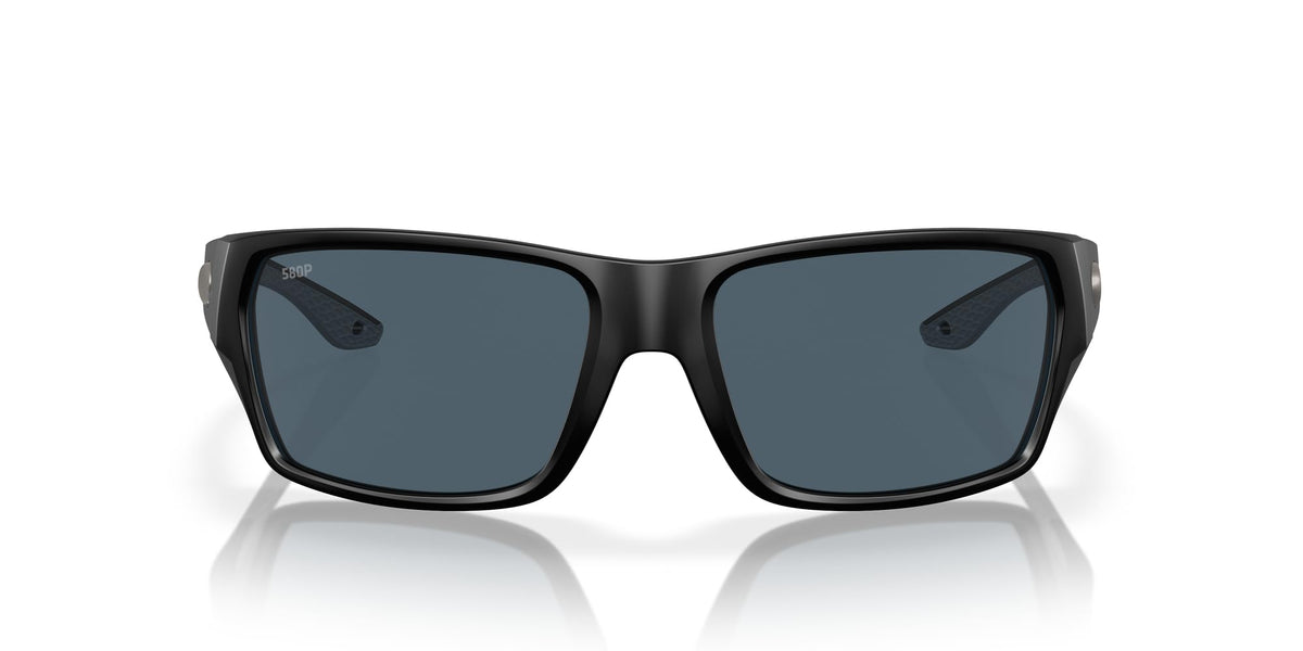 Costa Del Mar Tailfin front view showing matte black frame and grey lenses for versatile style