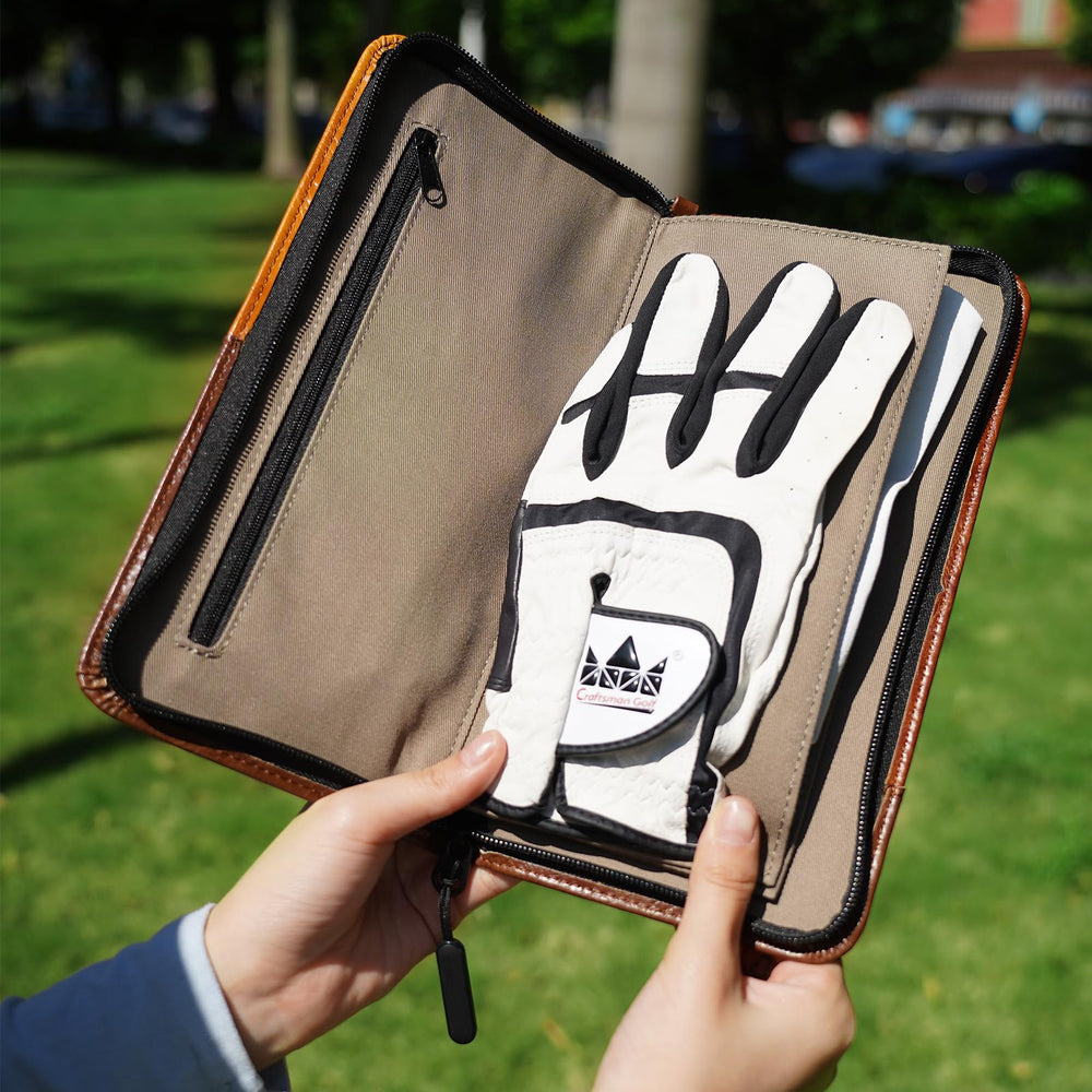 CRAFTSMAN GOLF pouch on golf cart next to clubs illustrating course-ready convenience