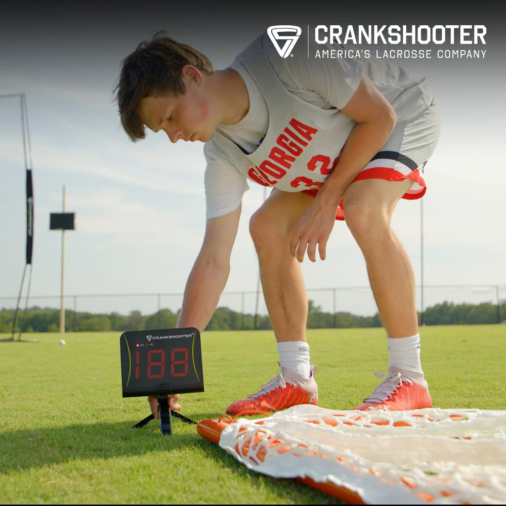 CRANKSHOOTER radar next to ball showing compact size for easy transport
