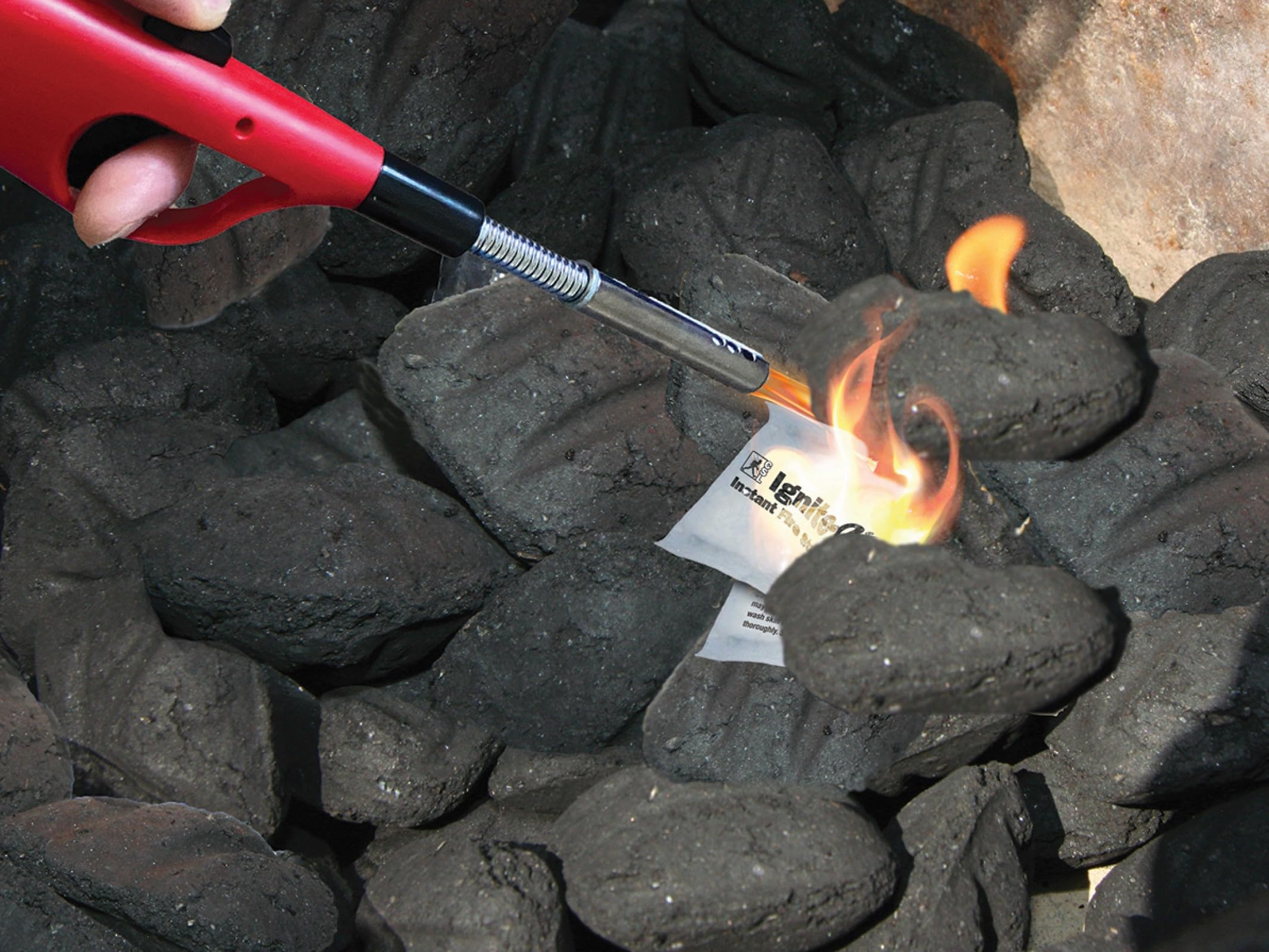 Creosote Ignite-O used to start a campfire offering dependable outdoor ignition