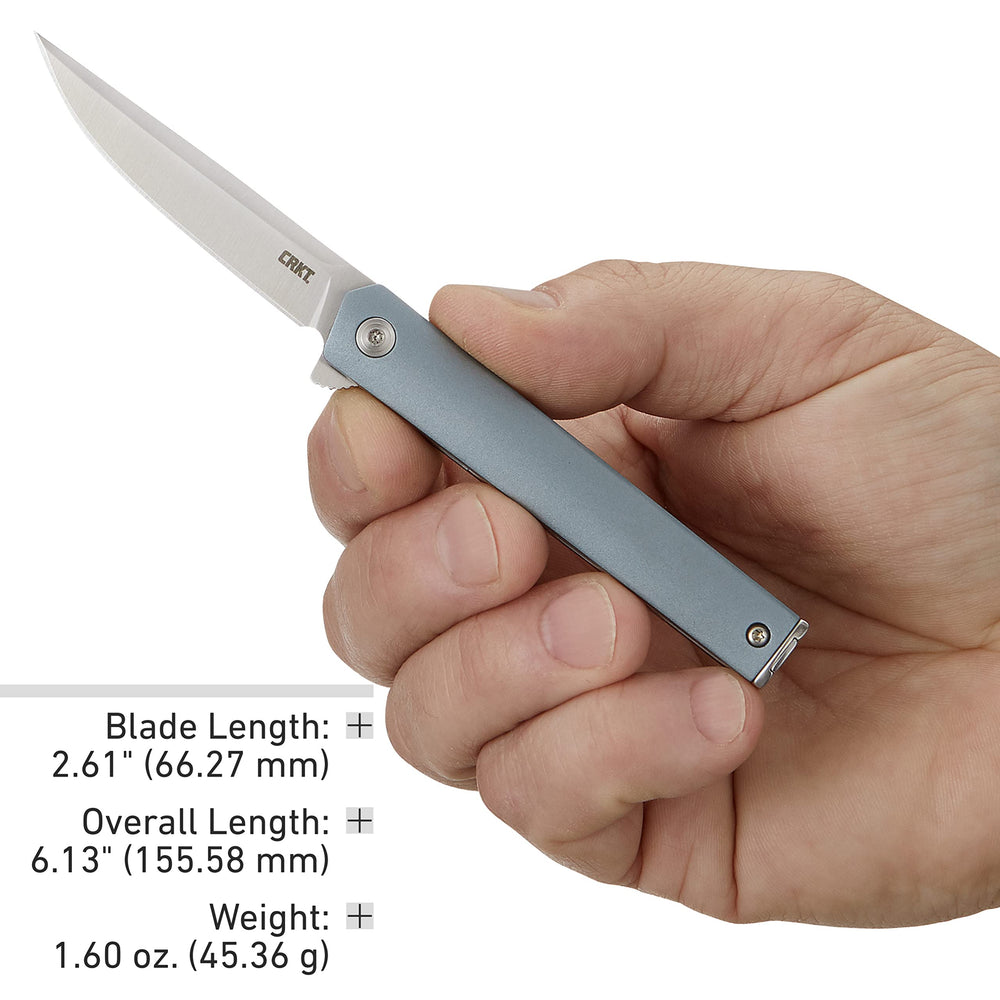 CRKT CEO compact on desk with notebook showing professional carry benefit