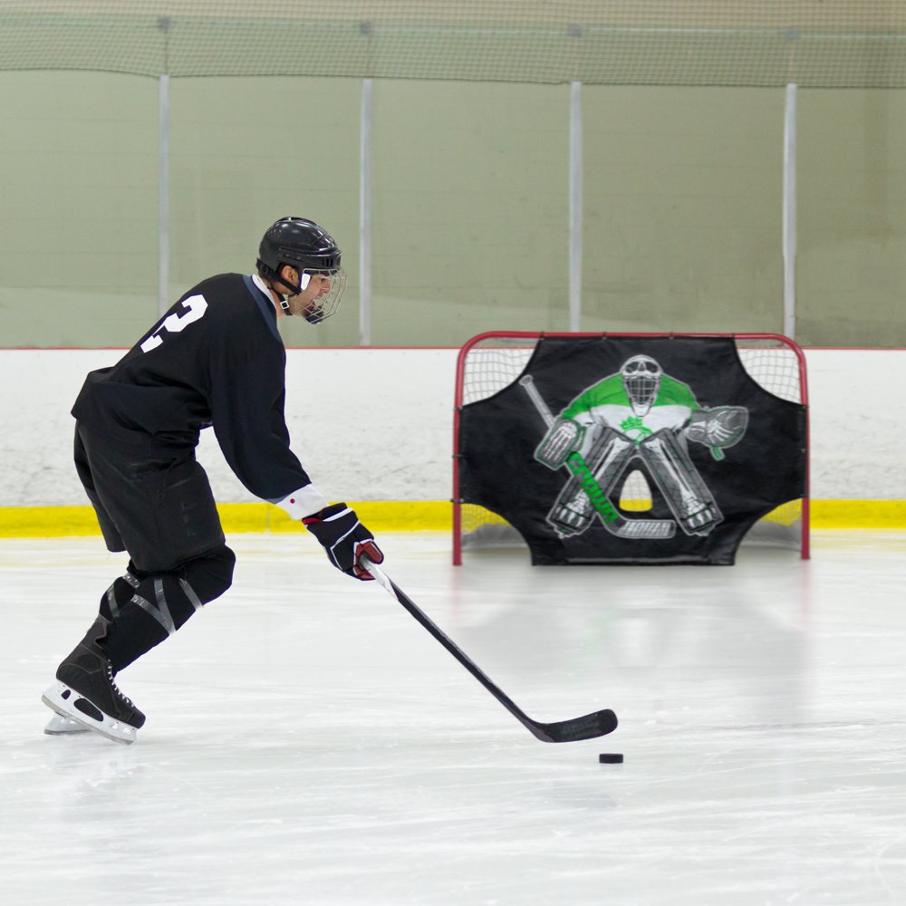 Crown Sporting Goods target mounted on a driveway goal during shooting drills