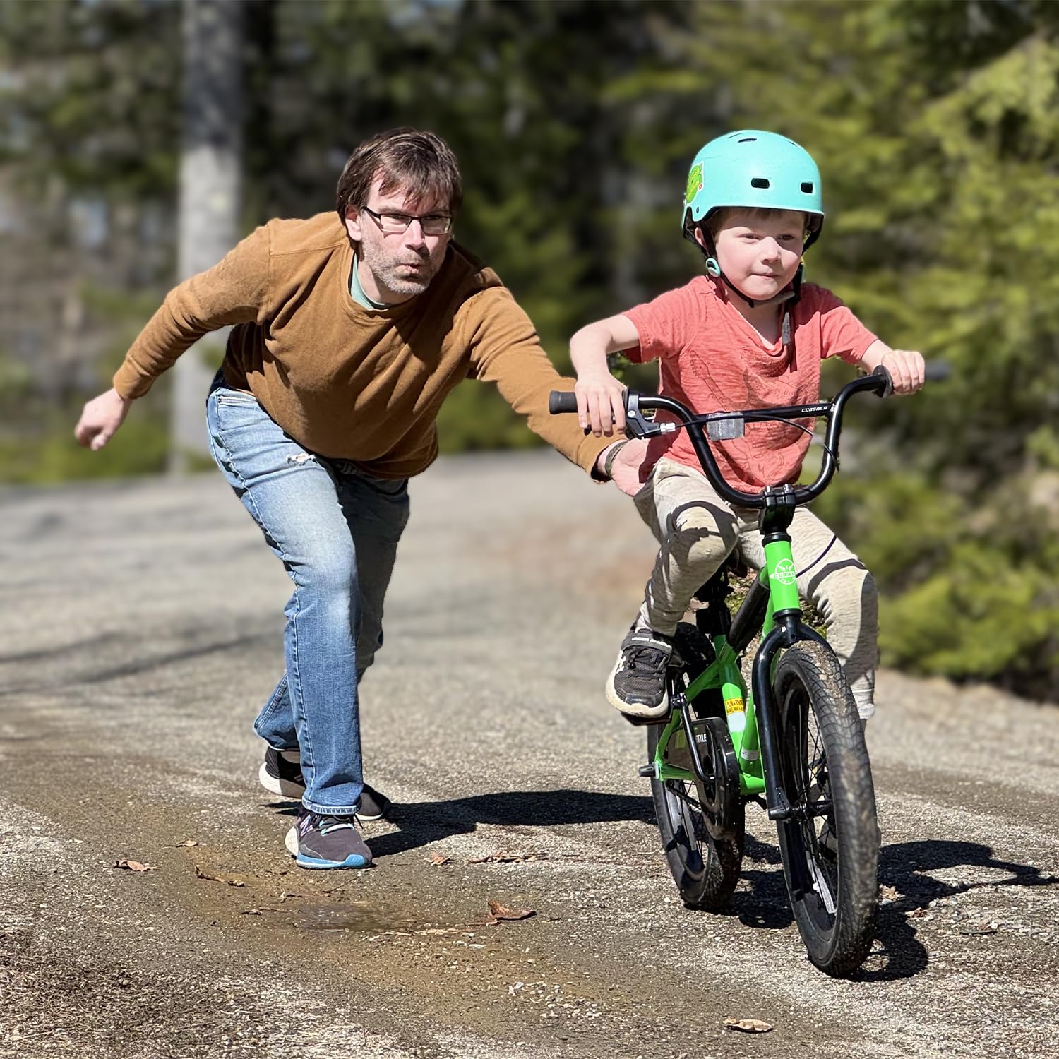 cubsala bike beside child to show correct height fit and scale