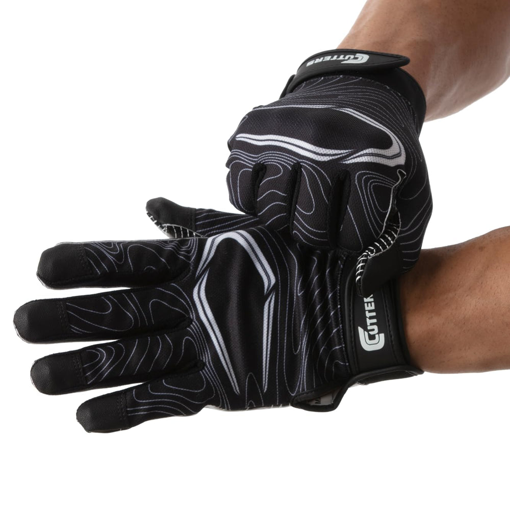 Cutters glove beside a hand for clear size and fit comparison