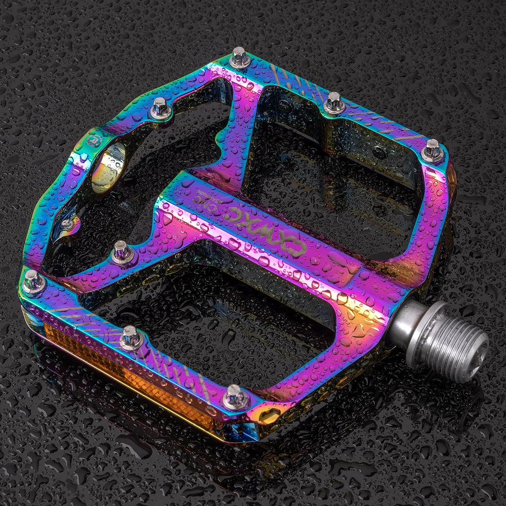 CXWXC pedals next to shoe to show size and rider fit