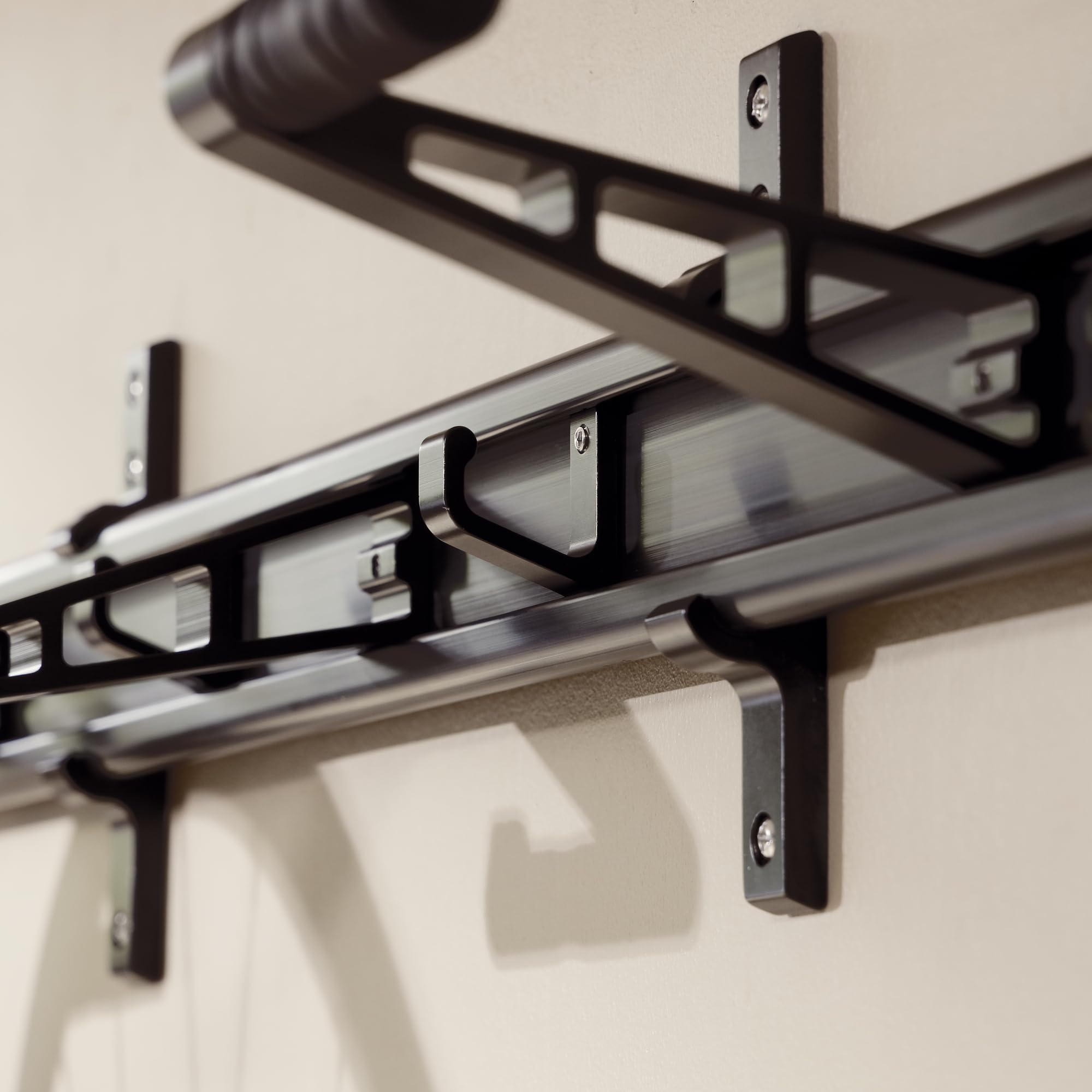 CyclingDeal rack next to measuring tape showing compact size and scale