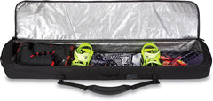Dakine Tour exterior zip pocket open with tuning kit for quick access benefit