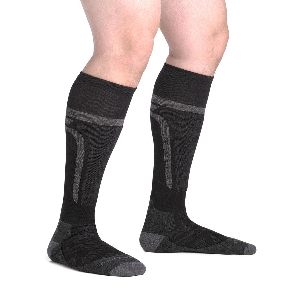 Darn Tough Edge over-the-calf height beside ruler, shows coverage and fit
