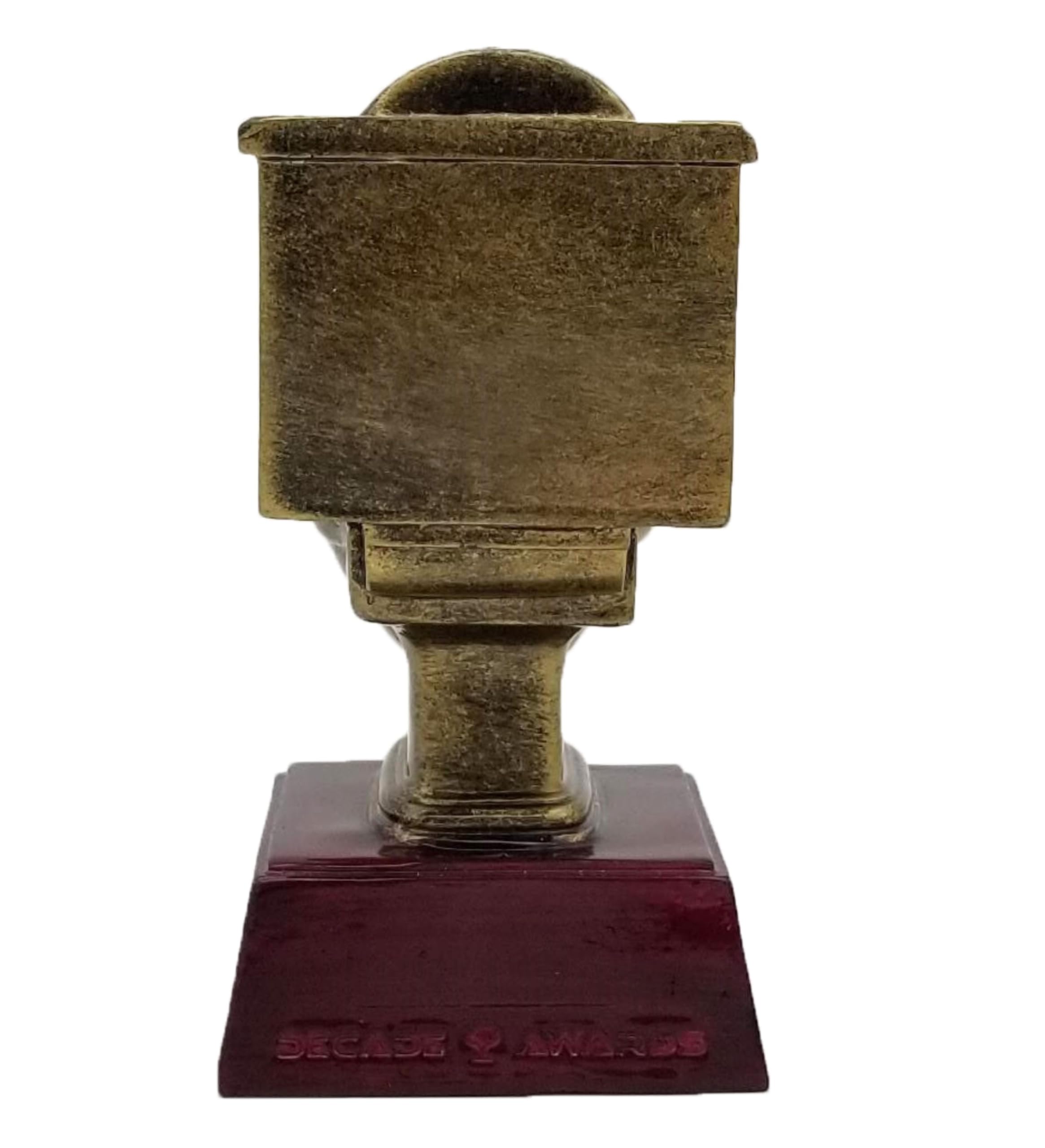 Decade Awards trophy placed on desk to show scale and shelf-friendly footprint
