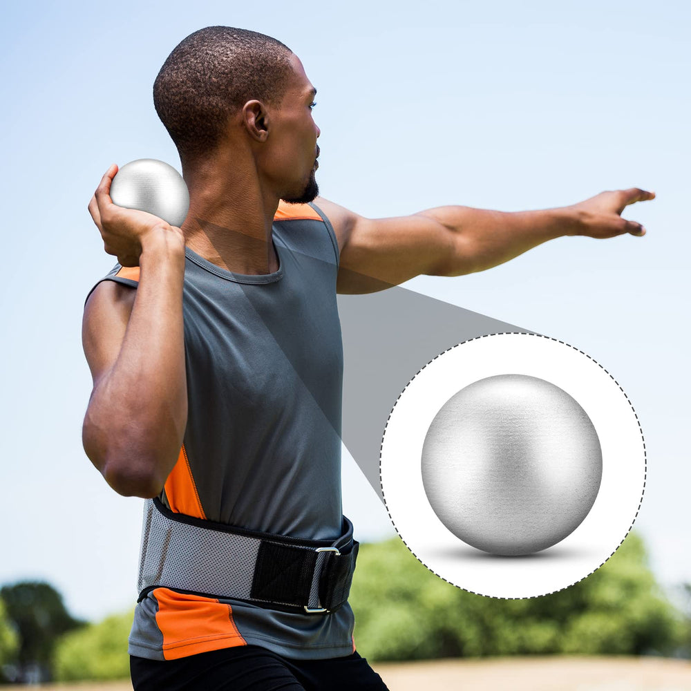 Deekin shot put resting on track highlighting consistent training weight