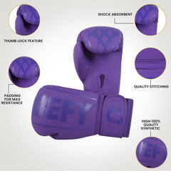 DEFY gloves striking heavy bag in gym demonstrating impact absorption benefit