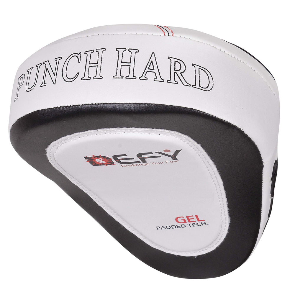 DEFY mitt beside water bottle to show size comparison and easy transport